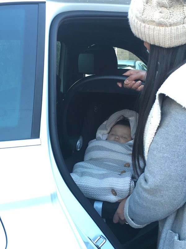 The risks of babies wearing coats and bulky layers in car seats